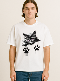 Unisex oversized white t-shirt featuring a black and gray cat with pink eyes and black paw prints design