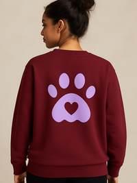 Unisex maroon sweatshirt with purple paw print and heart design on back, made of 100% combed cotton, wrinkle-free and smooth fabric.