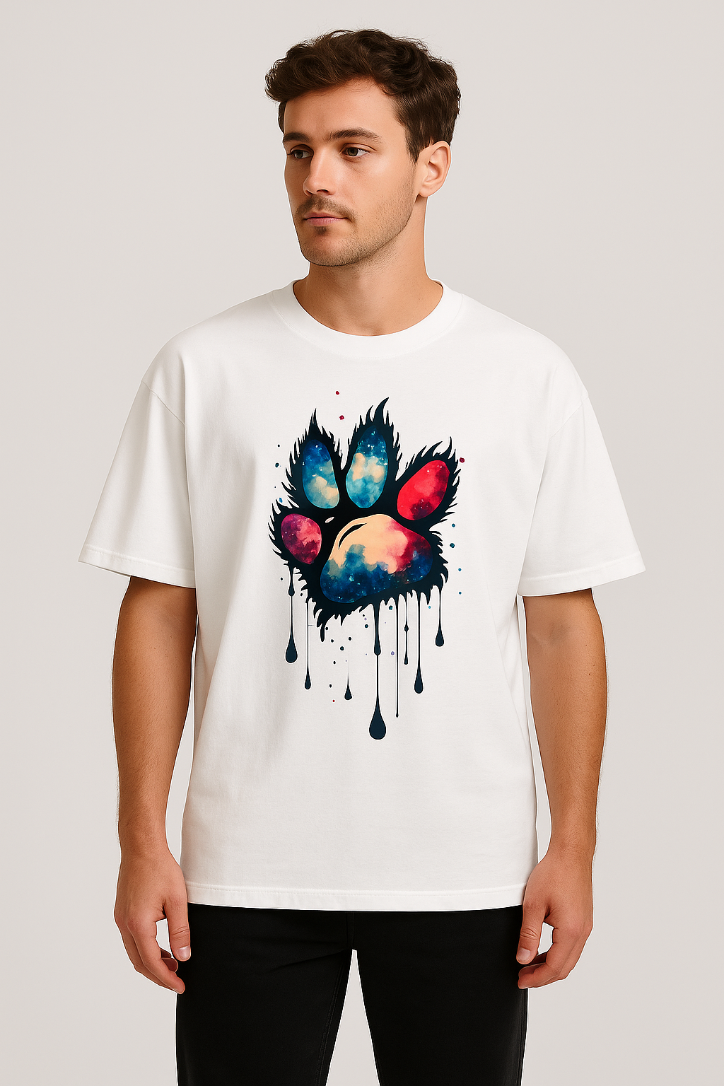 Unisex oversized white t-shirt with vibrant multi-hue paw print graphic and relaxed fit