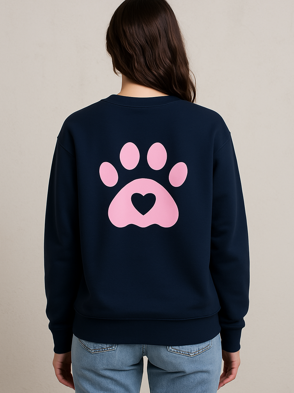 Unisex navy sweatshirt with pink paw print and heart design on back, made from 100% combed cotton, wrinkle-free and smooth fabric.