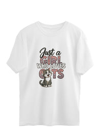 White oversized t-shirt with "Just a Girl Who Loves Cats" text and cute cat graphic, soft cotton, eco-friendly print, unisex fit.